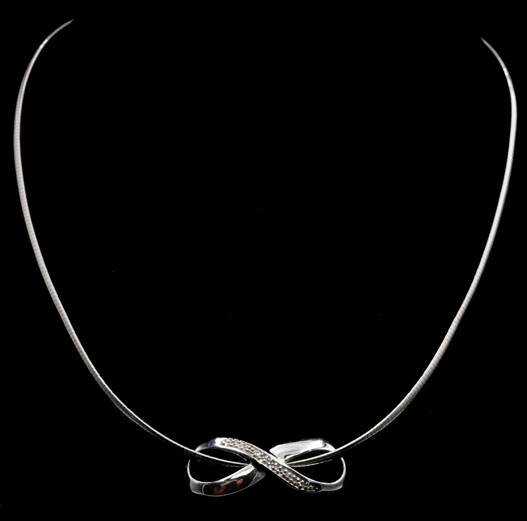 Infinity white gold necklace